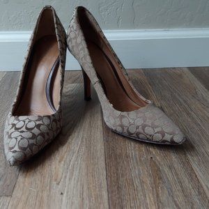 Coach pumps 7B